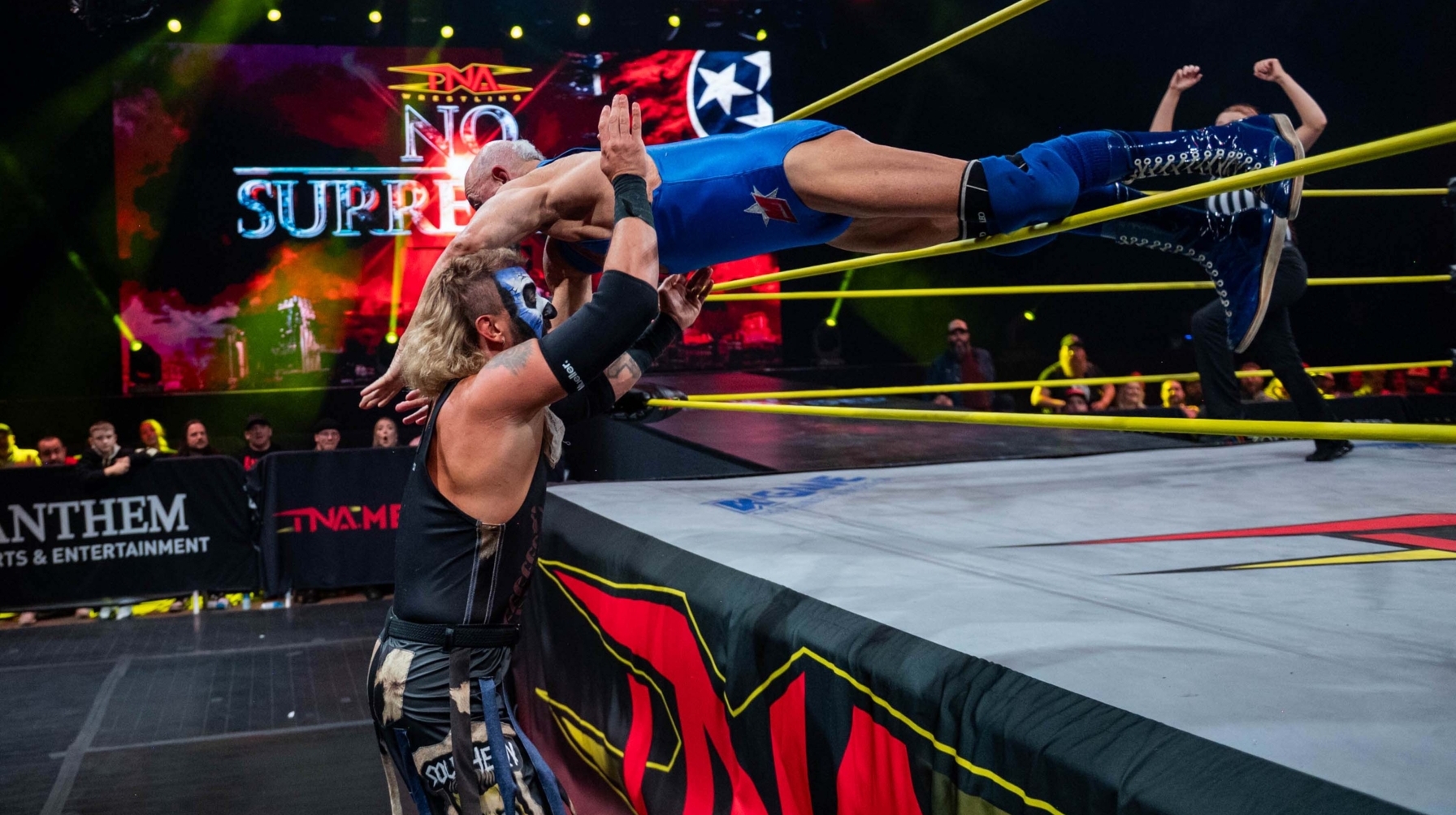 Mike Jackson Dives Through the Ropes and Wipes Out Mance Warner